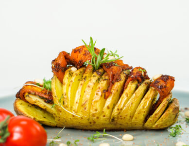 Hasselback potatoes with spicy carrot strips